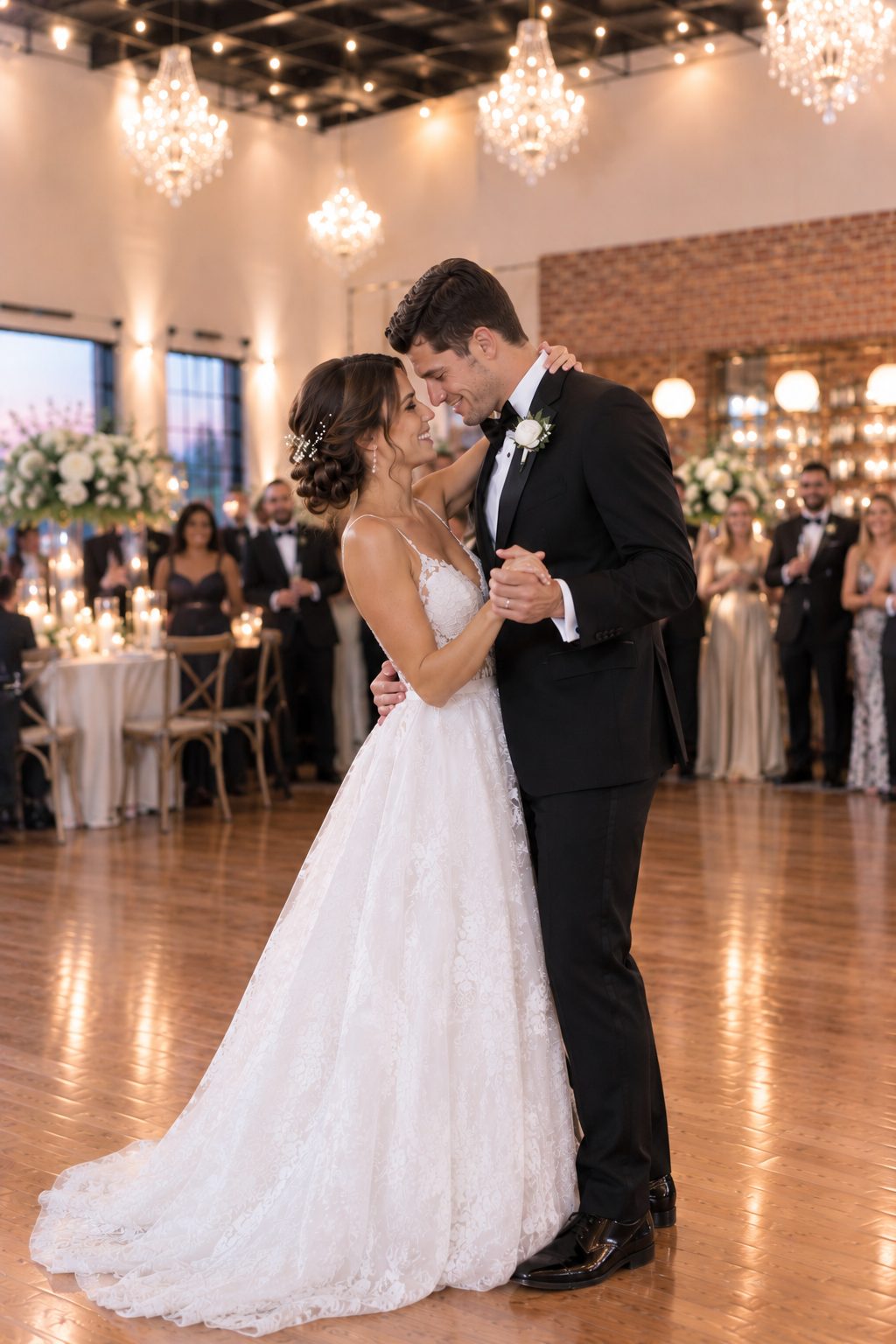 Artist rendering of a bride and groom sharing a quiet moment during their first dance with wedding guests behind them